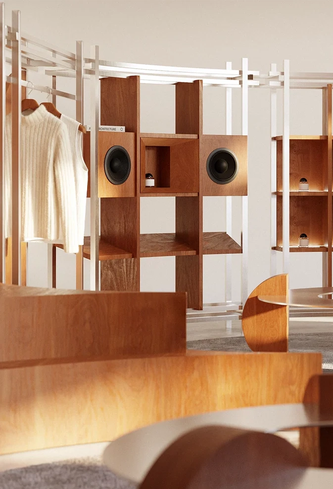 Pop-Up Store by NOCOD Studio — full circular interior. Oak modular shelving, perimeter metal rail system, organic sculptural forms and round rug.