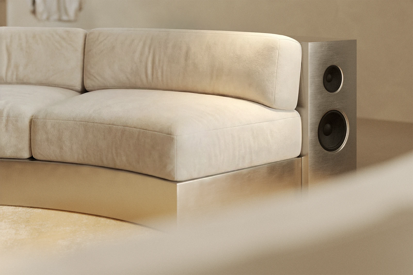 NOVU concept store — curved sofa section with integrated brushed steel speaker panel. Ivory velvet, metal base. Custom furniture design by NOCOD Studio.